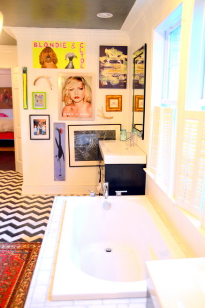 A view of Emily's gallery wall in her bathroom