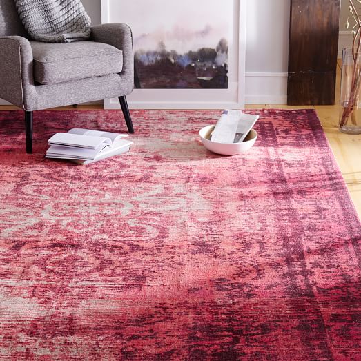 Distressed arabesque rug